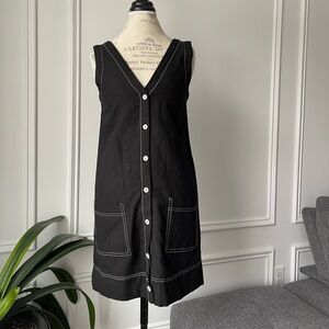 Elegant black shift dress with white contrast topstitching